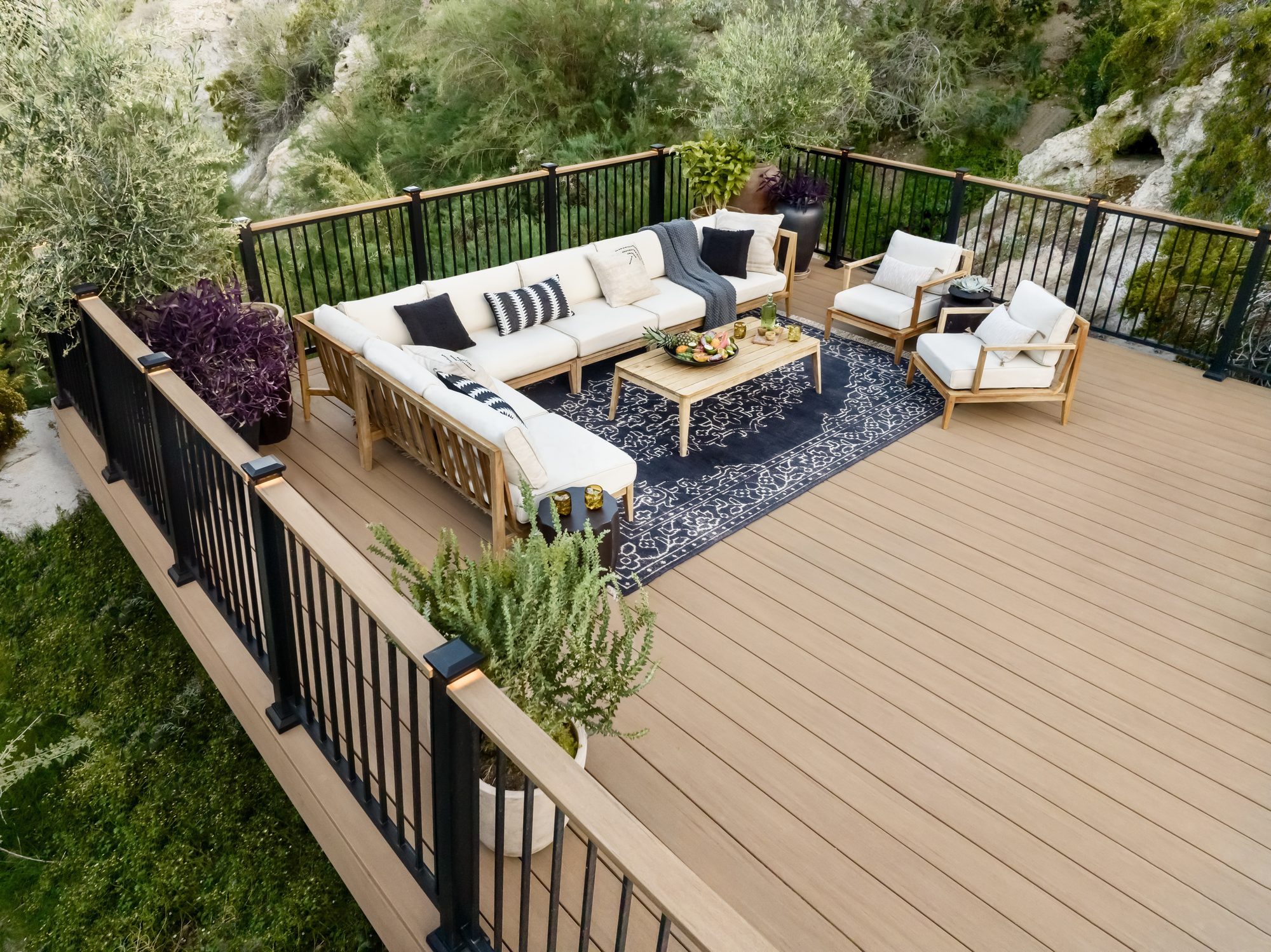 Aerial view of a completed TimberTech Weathered Teak PVC deck